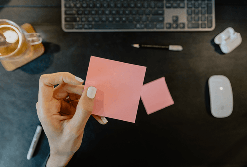 Hand Holding Sticky Note Mockup