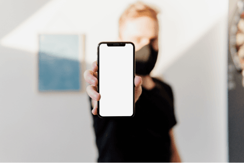 Black Iphone In Hand Mockup