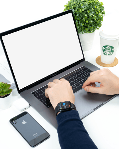 Macbook Mockup With Iphone On A Table