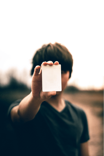 Adult Hand Holding Card Mockup