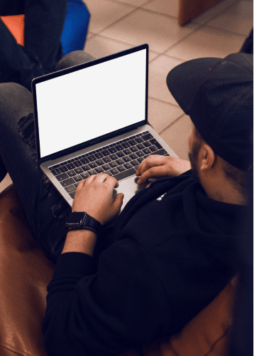 Man Working On A Macbook Mockup