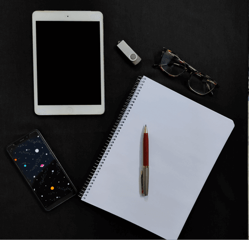 White Ipad Mockup Top View With Notebook And Pen