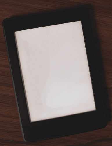 Kindle Mockup On Table Top View